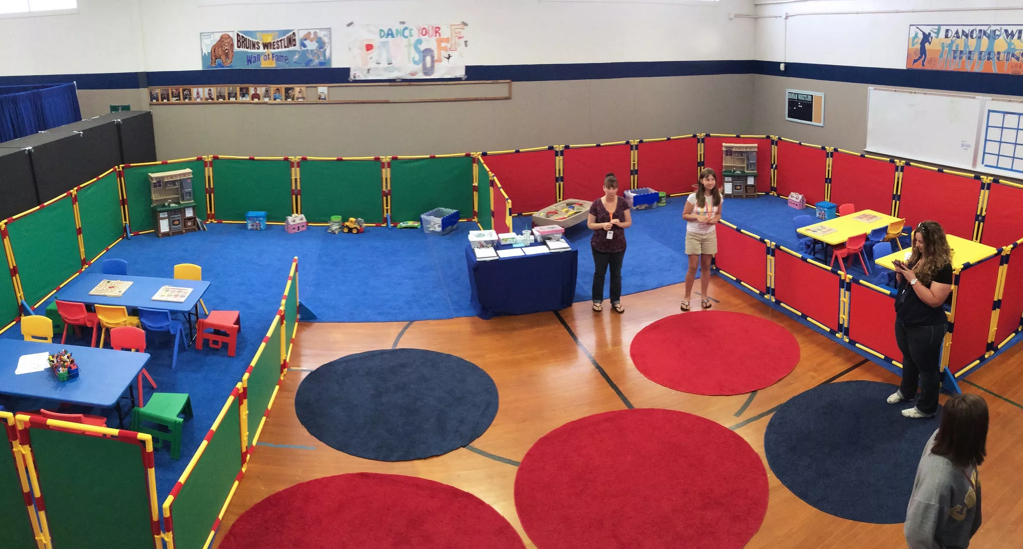 a portable, colorful set up of a kid's ministry in a temporary church plant space